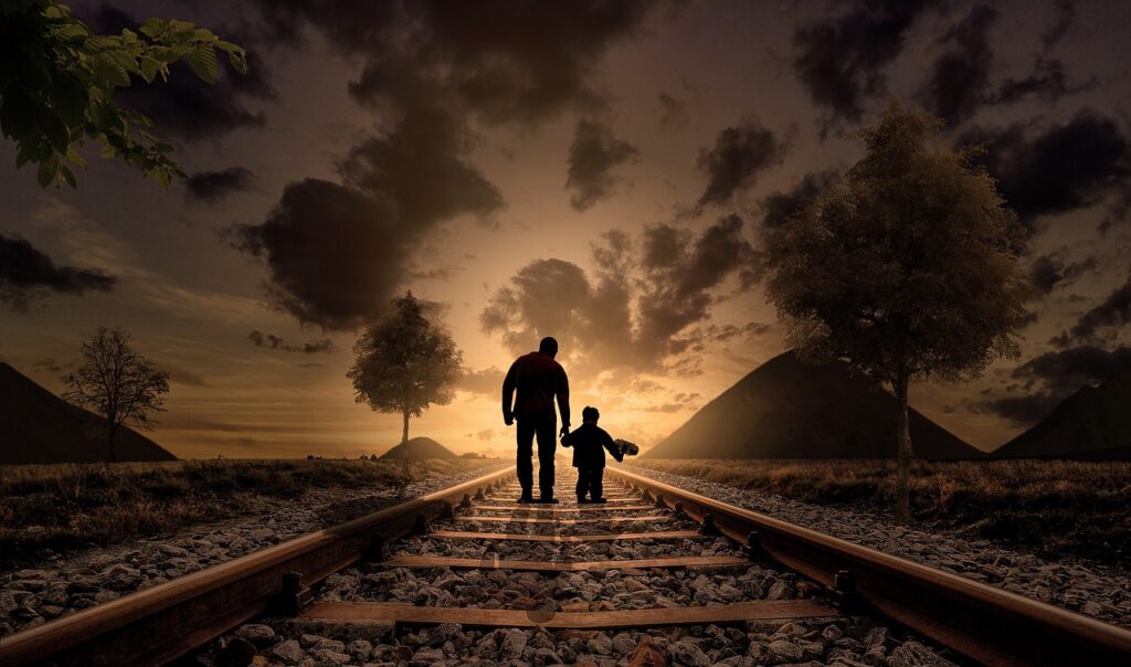 How financial advisors can help you create generational wealth father and son, walking, railway, railroad, gravel, silhouettes, nature, sunset, family, dusk, twilight, walking together, parent, fatherhood, parenthood, love, child, joy, childhood, father, boy, kid, together, railroad tracks, adventure